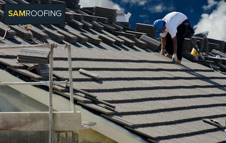 Professionals applying EPDM roofing material on a commercial structure.